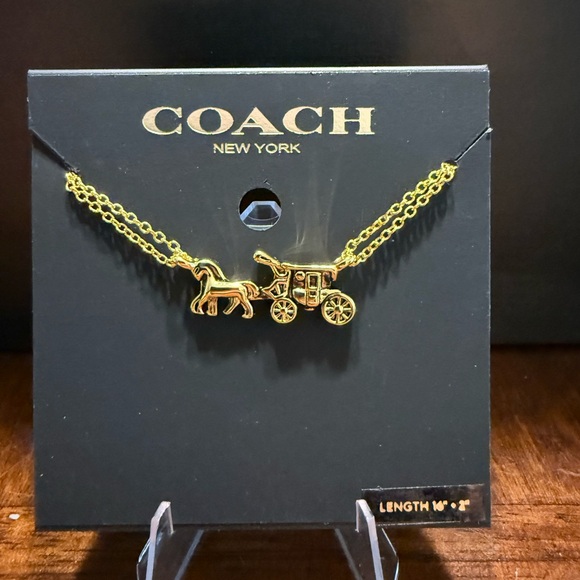 NWT Coach Horse and Carriage double chain necklace in gold-tone plated brass